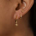 Three-piece golden star and moon earring set including studs and hoops on ear - Set of 3 (H-169) / KC Gold