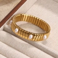 Pulsera elástica de acero dorado con perlas artificiales y diseño retro extensible - Estilo con Decoración de Perla Ovalada / Dorado