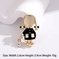 Cute golden girl brooch with cat eye stone face and black enamel bows - Cute Girl Opal