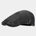 Close-up of vintage denim flat cap with grey patchwork textures and metal buckle - Adjustable / Black