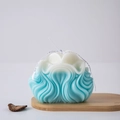Blue and white gradient wavy art candle with ribbon on a light wooden base - Wave Pattern 4 / Blue