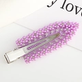 Purple flower hair clip with sparkling rhinestones and pearls on a sleek metal base - Purple
