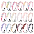 Macro view of eighteen candy-colored glitter heart and star headbands for kids - 18 Mixed Colors Style