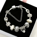 Silver plated beaded bracelet with Love charm and butterfly pendants on black velvet - Silver Bracelet - 7