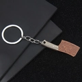 Portachiavi mini mannaia in metallo con motivo damasco e finitura in rame su sfondo nero - Coltello A (Bronzo)
