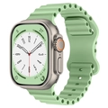 Detail of light green wavy silicone ocean strap with adjustable holes for smart watch - Pistachio