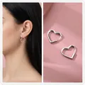 Polished silver heart-shaped hoop earrings for women with minimalist cutout design - Silver Heart Buckle