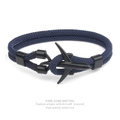 Detail of blue hand-knitted Milan rope bracelet with a black aircraft charm - Navy Blue Rope Black Airplane