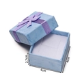 Detail view of 4x4x2.7cm blue jewelry gift box with textured paper and purple bow - Purple Ring Box (4x4x2.7cm)