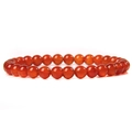 Detailed top view of a translucent 6mm red agate beaded elastic bracelet on white background - Red Agate (FD6825) / 6mm/19cm