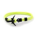 Close-up of neon green paracord bracelet featuring a black airplane charm and hardware - Black Airplane Buckle / Fluorescent Green