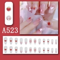 Detail of long coffin press-on nails with red heart patterns and white drip texture - Red Heart Pink Gradient (A523)
