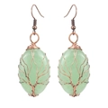 Detail of handmade bronze wire-wrapped tree of life earrings with light green stones - Antique Copper + Green Aventurine