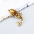 Handmade koi fish resin ornament with gold foil flakes for desktop decoration - Strawberry Quartz