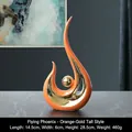 Modern abstract ceramic phoenix statue in orange and gold finish for home decor - Phoenix Flight - Orange Gold High