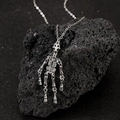 Gothic skull pendant necklace in silver alloy on dark rock, punk hip-hop style accessory - Antique Silver Movable Joint Skull Necklace (WG-0369)