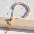 Adjustable gold plated tennis bracelet with sparkling rectangular clear zircon stones - Slider Clasp Gold-White