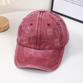Vintage washed red cotton baseball cap with distressed rip details and adjustable strap - Red