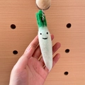 Handmade white radish wool felt keychain with smiling face and green leaves - White Radish