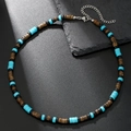 Bohemian tribal necklace with turquoise and wood beads on black stone backdrop - Blue/Brown/Black Beads (ZJ12765)