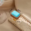 Vintage style gold open ring with large rectangular turquoise stone and crystal halo - K-0616 Turquoise Texture Open Ring
