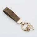 Khaki suede leather car keychain with golden metal ring and stitching detail - Khaki/Gold