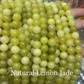 Close-up of natural lemon jade round beads with smooth translucent texture for DIY jewelry - Natural Lemon Jade 4mm (Approx. 90pcs) Strand