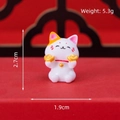 Mini resin lucky cat figurine holding gold ingots for desktop or car decor - Cat Holding Ingot