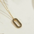 Élégant collier doré avec pendentif ovale serti de zircons cubiques noirs scintillants - Noir