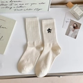 Cream striped mid-calf cotton socks featuring black star embroidery and AND lettering - White