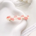 Checkered wave hair clip in pink and cream finish with a secure gold metal base - Pink & Beige Plaid