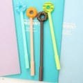 Cute student neutral pens with colorful silicone donut shaped toppers in assorted vibrant colors - Chocolate Donut Gel Pen