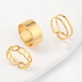 Three-piece gold titanium steel ring set with wide, double-line, and hollow designs - Open Ring Set / Gold