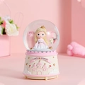 Pink musical crystal ball with blonde princess and castle relief on base - Princess & Castle-Pink