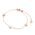 Rose gold chain bracelet featuring three triangular pendants with white inlay detail - Shell Rose Gold