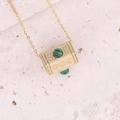 Macro detail of gold cylinder pendant with scroll relief and green malachite gemstone - Vintage Texture Green Malachite Cylinder Style (19#)