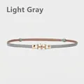 Elegant light gray faux leather belt for women featuring a refined pearl and rhinestone buckle - Light Gray