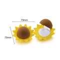 Detail view of sunflower shaped yellow velvet jewelry box showing open and closed states - Sunflower Yellow