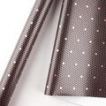 Gift wrapping paper with metallic rose gold hexagonal honeycomb pattern on black background - Snakeskin Gold Foil