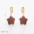 Detailed view of star-shaped hoop earrings with dimensions 3.9cm by 2cm and 7.8g weight - Star Earrings (A2-04)