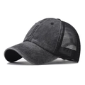 Deep grey washed cotton trucker hat with breathable mesh back in a 45-degree side view - Adjustable / Black/Black Mesh