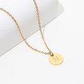 Gold stainless steel necklace featuring a round pendant engraved with the letter N - Gold N