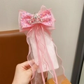 Barrette à cheveux rose pour fille avec couronne scintillante et longs rubans en organza - Pêche
