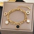 Double-layered 18k gold plated bracelet featuring Roman numeral rings with shell inlays - Gold Roman Numeral Mother of Pearl Style (5116)