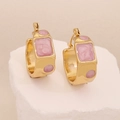 Irregular geometric gold earrings with pink marble resin inlays on a stone base - Purple