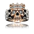 Macro shot of a punk skull crown ring featuring two-tone metal and white zircon details - US 7