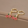Macro detail of S925 cherry earrings with red round stones and green marquise gems - Gold Rose Red Cherry