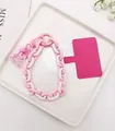 Cordino da polso a catena rosa e bianca con ciondoli a forma di orso e cuore su vassoio - Stile Rosa e Bianco