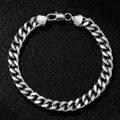 Close-up of a silver stainless steel Cuban link bracelet with a secure lobster clasp - Steel