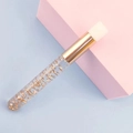 Detail of soft white eyelash cleansing brush with golden glitter transparent handle - Gold Glitter + Gold Ferrule